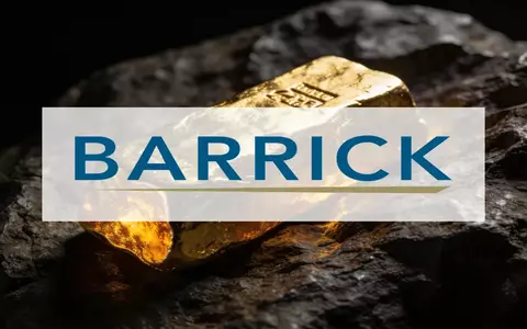 Ein glänzender Goldbarren auf dunklem Gestein, der die Stabilität und den Wert des Edelmetallmarktes symbolisiert. - Foto: über boerse-global.de