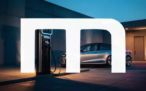 Moderne Ladestation für Elektrofahrzeuge in einer minimalistischen Industrieumgebung bei Dämmerung. - Foto: über boerse-global.de