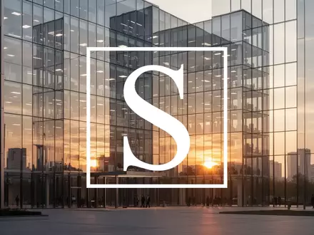 Modernes Bürogebäude in der Morgensonne als Symbol für Finanzstabilität und Wachstum - Foto: über boerse-global.de