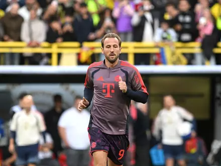 Harry Kane beim Aufwärmen in Dortmund.  - Foto: Bernd Thissen/dpa