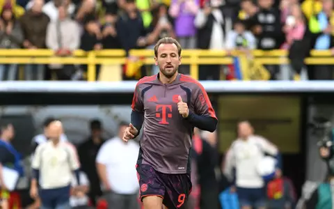 Harry Kane beim Aufwärmen in Dortmund.  - Foto: Bernd Thissen/dpa