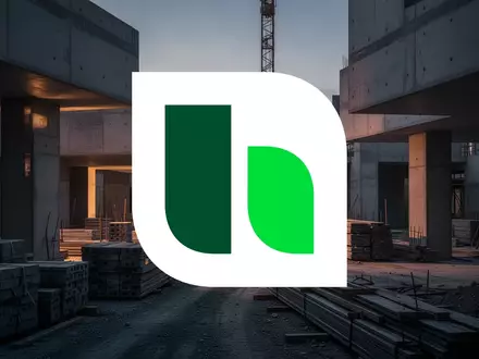 Abstrakte Darstellung einer Baustelle mit Betonstrukturen in der Abenddämmerung als Symbol für die Baustoffindustrie. - Foto: über boerse-global.de