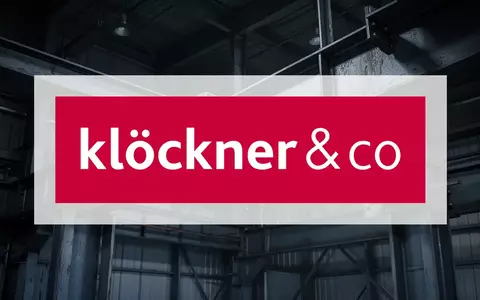 Abstrakte Darstellung einer industriellen Lagerhalle in kühlem Licht als Symbol für wirtschaftliche Herausforderungen. - Foto: über boerse-global.de