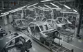 Leere Fertigungslinie in einem Volkswagen-Werk mit unfertigen Fahrzeugkarosserien in einer modernen Industriehalle. - Foto: über boerse-global.de