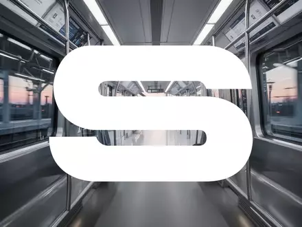 Abstrakte Darstellung moderner Schienentechnik und Eisenbahninfrastruktur mit Fokus auf Licht und Dynamik. - Foto: über boerse-global.de