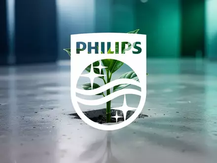 Ein kleiner grüner Pflanzenspross auf einer modernen, minimalistischen Oberfläche als Symbol für nachhaltige Finanzen. - Foto: über boerse-global.de