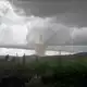 Der Tornado verwüstete Teile des Ortes. - Bild: Cyrille Kaldor/UGC via AFP/dpa