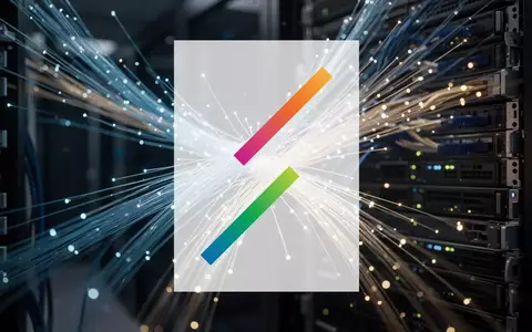 Abstrakte Darstellung von Glasfaserkabeln mit blauem und goldenem Licht in einer modernen, technologischen Umgebung. - Foto: über boerse-global.de