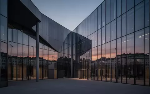 Moderne Architektur eines Verwaltungsgebäudes in der Abenddämmerung als Symbol für staatliche Sozialsysteme. - Foto: über boerse-global.de