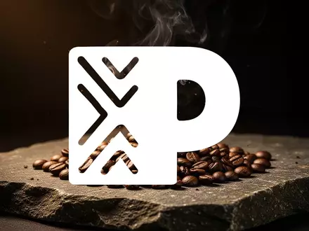 Dampfende Kaffeebohnen auf einer dunklen Steinoberfläche bei stimmungsvoller Beleuchtung. - Foto: über boerse-global.de