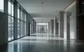 Moderner, leerer Flur in einem Regierungsgebäude mit minimalistischer Architektur und einfallendem Tageslicht. - Foto: über boerse-global.de