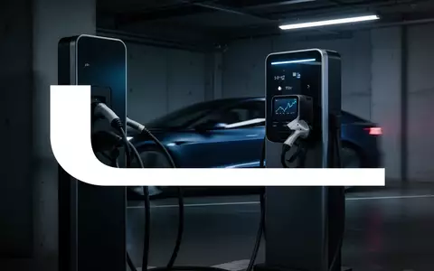 Abstrakte Darstellung einer modernen Ladestation für Elektroautos in einer stimmungsvollen, minimalistischen Industriehalle - Foto: über boerse-global.de