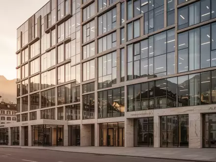 Moderne Fassade eines hochwertigen Schweizer Geschäftshauses bei goldenem Licht. - Foto: über boerse-global.de