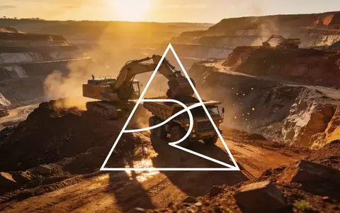 Weitläufige industrielle Bergbaulandschaft bei Sonnenaufgang als Symbol für großangelegte Rohstoffprojekte - Foto: über boerse-global.de