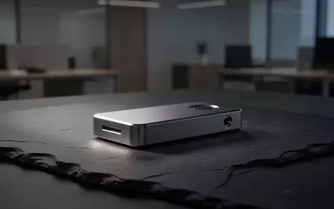 Eine Hardware-Wallet für Kryptowährungen liegt auf einer dunklen Schieferoberfläche. - Foto: über boerse-global.de