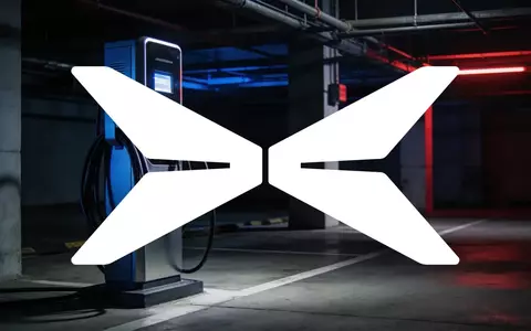Moderne Ladestation für Elektroautos in einer düsteren, industriellen Umgebung als Symbol für die Automobilbranche. - Foto: über boerse-global.de