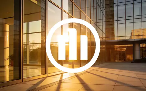 Abstrakte Darstellung eines modernen Bürogebäudes bei Sonnenaufgang als Symbol für finanzielle Stabilität und Erfolg. - Foto: über boerse-global.de