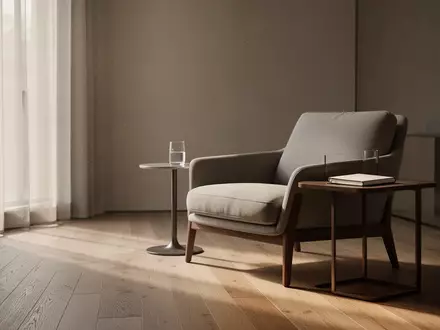 Ein minimalistisch eingerichteter, ruhiger Wohnraum mit sanftem Tageslicht, der eine Atmosphäre von Entspannung und Rückzug ausstrahlt. - Foto: über boerse-global.de