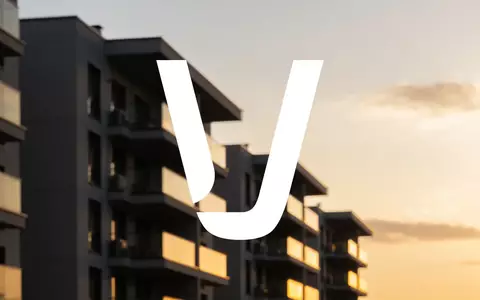Moderne Wohnimmobilien vor einem Abendhimmel als Symbol für den Immobilienmarkt. - Foto: über boerse-global.de