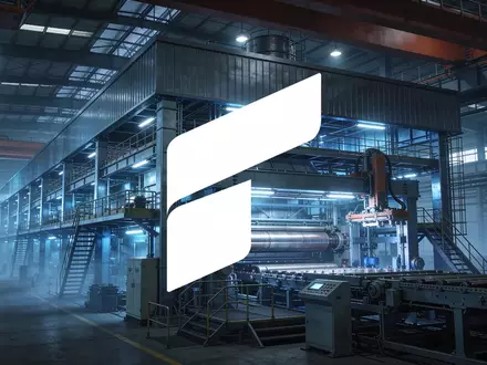 Moderne industrielle Fertigungshalle mit technischer Beleuchtung und Fokus auf Präzisionsbau. - Foto: über boerse-global.de