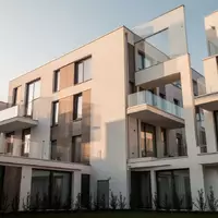 Moderne Wohnanlage bei Tageslicht, Fokus auf die architektonische Fassadengestaltung. - Foto: über boerse-global.de