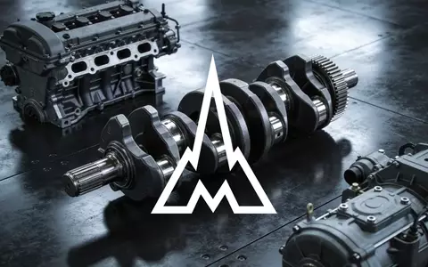 Industrielle Motorenkomponenten auf einer dunklen, metallischen Oberfläche bei stimmungsvollem Licht. - Foto: über boerse-global.de
