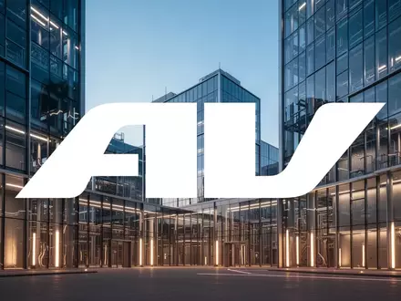 Moderne Industriearchitektur bei Dämmerung als Symbol für Investitionen und technologischen Fortschritt. - Foto: über boerse-global.de