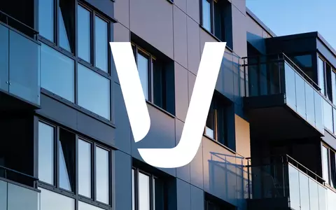 Moderne Wohnhausfassade in der Abenddämmerung als Symbol für den Immobilienmarkt - Foto: über boerse-global.de