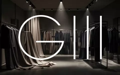 Moderne, minimalistische Mode-Einzelhandelsumgebung mit atmosphärischer Beleuchtung und Fokus auf Textilien. - Foto: über boerse-global.de