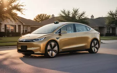 Ein goldenes, autonomes Robotaxi ohne Lenkrad und Pedale steht auf einem asphaltierten Platz bei Sonnenuntergang. - Foto: über boerse-global.de