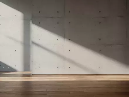 Ein minimalistischer, moderner Innenraum mit klaren Linien und sanftem Lichteinfall, der eine technologische Atmosphäre vermittelt. - Foto: über boerse-global.de