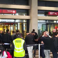 Die Abfertigung der Fluggäste wird so weit wie möglich auf Terminal 2 verlegt.  - Foto: Ann-Marie Utz/dpa