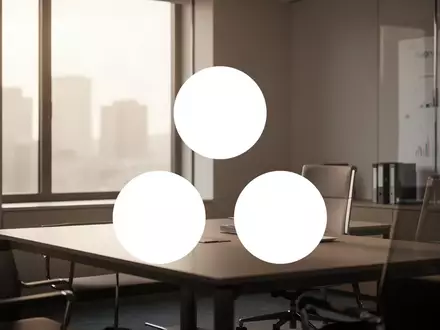 Abstrakte Darstellung einer modernen Büroumgebung mit gedämpftem Licht, die eine vorsichtige Marktstimmung symbolisiert. - Foto: über boerse-global.de