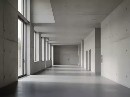 Ein minimalistischer Flur in einem Regierungsgebäude mit klaren architektonischen Linien und natürlichem Licht. - Foto: über boerse-global.de