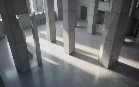 Ein minimalistisch gestaltetes, modernes Gebäudeinterieur mit klaren geometrischen Linien und natürlichem Lichteinfall. - Foto: über boerse-global.de