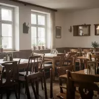 Leerer Gastraum eines traditionellen deutschen Restaurants mit Holztischen und Stühlen bei natürlichem Lichteinfall. - Foto: über boerse-global.de