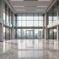 Ein heller, leerer Bürokomplex mit großen Glasfronten und polierten Böden, der die professionelle Arbeitsumgebung symbolisiert. - Foto: über boerse-global.de