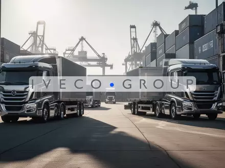 Abstrakte Darstellung einer industriellen Logistiklandschaft mit modernen Transportfahrzeugen bei Sonnenlicht. - Foto: über boerse-global.de
