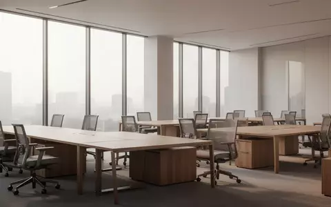 Ein minimalistisch gestalteter, leerer Büroarbeitsplatz mit hellen Holzmöbeln in einer lichtdurchfluteten, modernen Umgebung. - Foto: über boerse-global.de