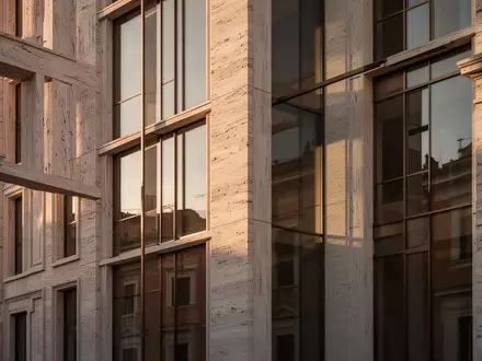 Moderne architektonische Fassade eines römischen Steingebäudes im warmen Licht der Abendsonne. - Foto: über boerse-global.de