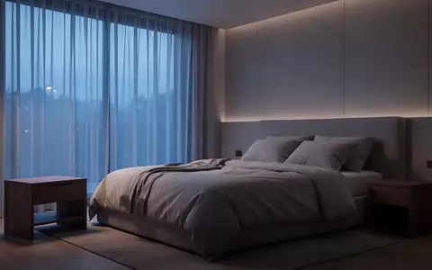 Ein minimalistisch eingerichtetes Schlafzimmer in den frühen Morgenstunden mit sanftem, natürlichem Licht. - Foto: über boerse-global.de