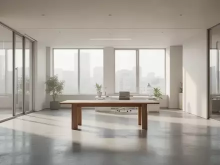 Ein minimalistischer, lichtdurchfluteter Büroraum mit klaren Linien und natürlichem Tageslicht. - Foto: über boerse-global.de