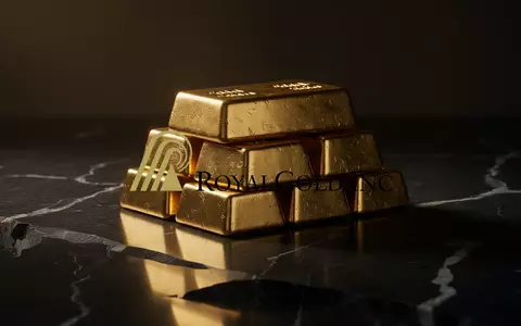 Glänzende Goldbarren auf einer dunklen, polierten Oberfläche als Symbol für Stabilität und Dividenden. - Foto: über boerse-global.de