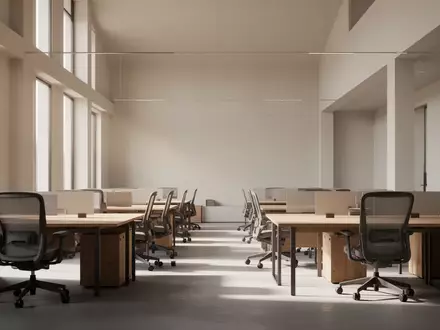 Ein minimalistisches, unbesetztes Büro mit modernen Schreibtischen und natürlichem Lichteinfall. - Foto: über boerse-global.de