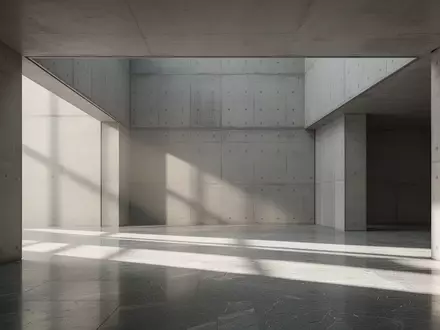 Ein minimalistischer, moderner Innenraum mit klaren architektonischen Linien und sanftem Lichteinfall. - Foto: über boerse-global.de