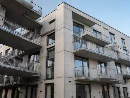 Moderne Wohnhausfassade bei Tageslicht als Symbol für professionelle Objektsicherungsprüfungen. - Foto: über boerse-global.de