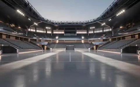 Eine weitläufige, moderne Sportarena in Riad bei Dämmerung mit minimalistischer Architektur und polierten Betonböden. - Foto: über boerse-global.de