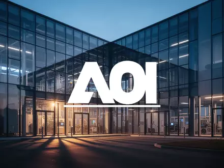Moderne Industrie- und Technologiegebäude in der Abenddämmerung mit atmosphärischer Beleuchtung. - Foto: über boerse-global.de