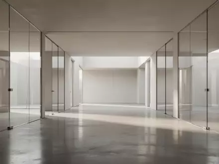 Ein minimalistisches, modernes Bürogebäude mit klaren architektonischen Linien und hellem Tageslicht. - Foto: über boerse-global.de