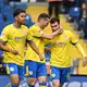 Maximilian Entrup (M) erzielte das 1:1 für Eintracht Braunschweig. - Bild: Swen Pförtner/dpa